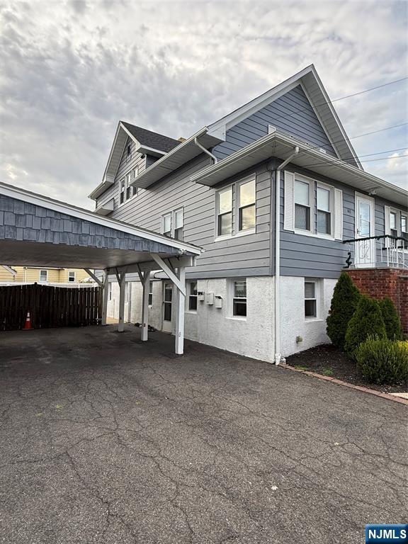 61 Sabina Street, Unit 1 Little Ferry, NJ 07643 - Photo 2 of 16 a view of a house with a garage
