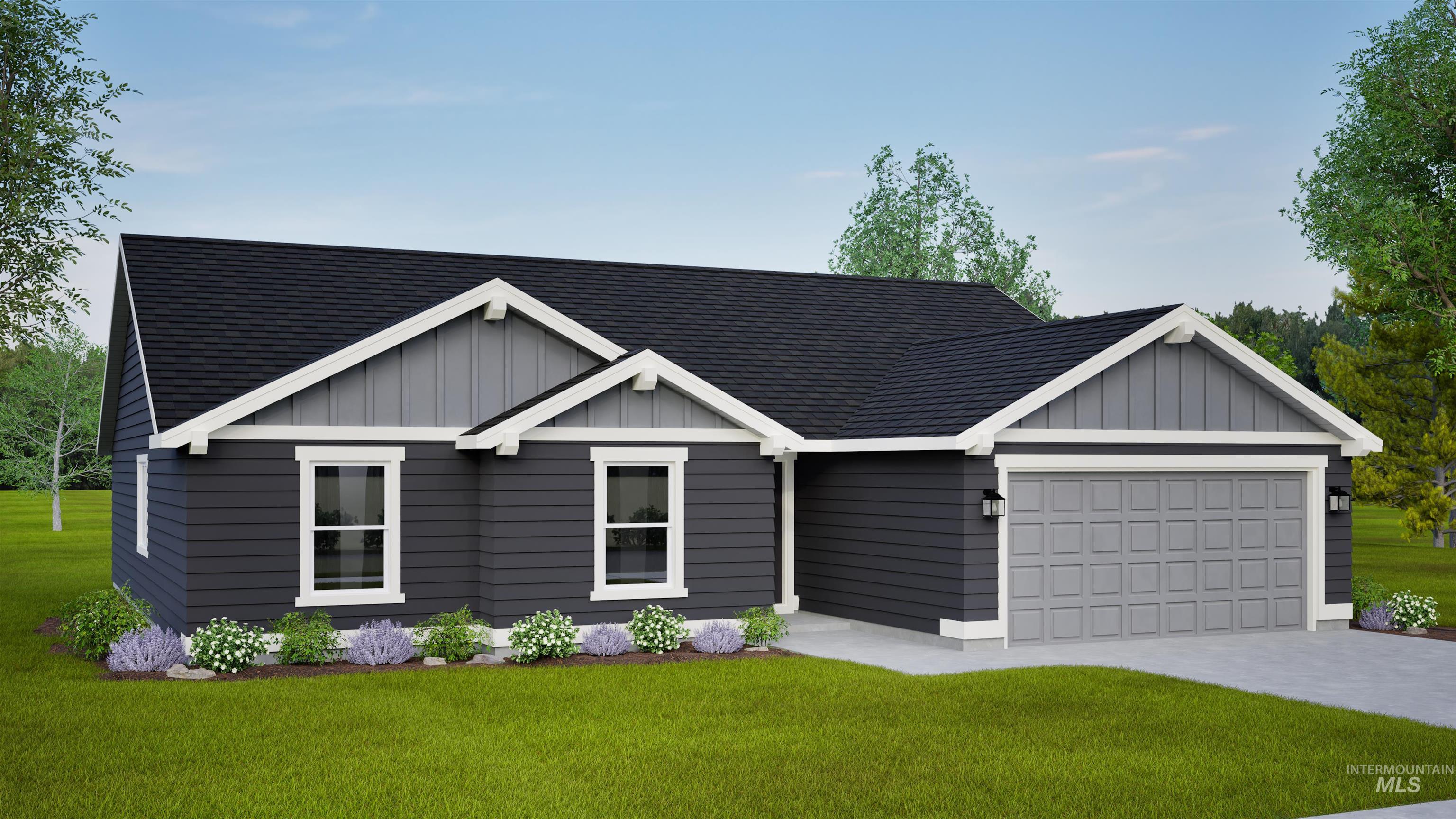 View of front facade with a shingled roof, board and batten siding, and a front lawn