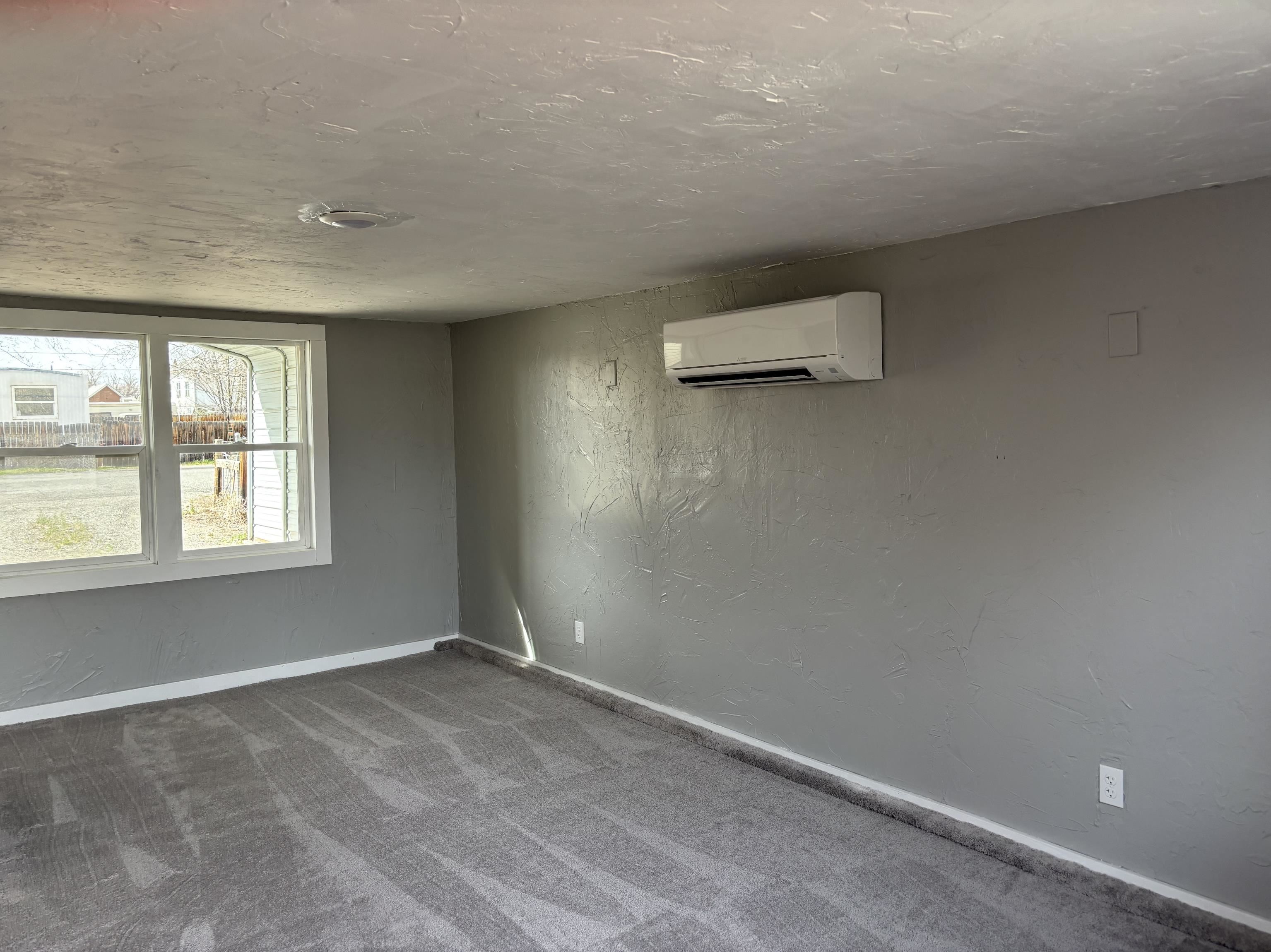 154 3rd Street Clifton, CO 81520 - Photo 12 of 14 an empty room with windows
