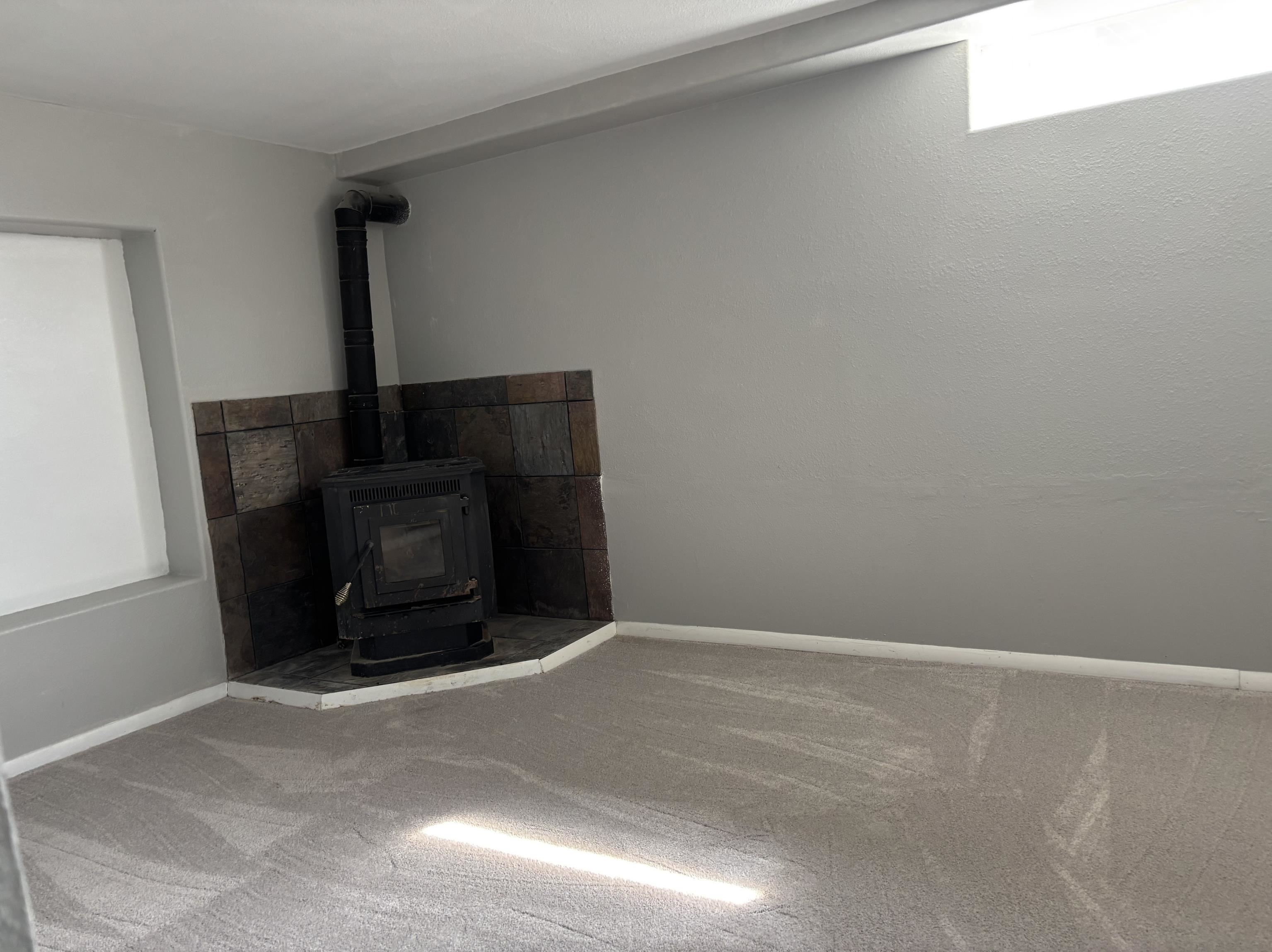 154 3rd Street Clifton, CO 81520 - Photo 13 of 14 a room with a fireplace