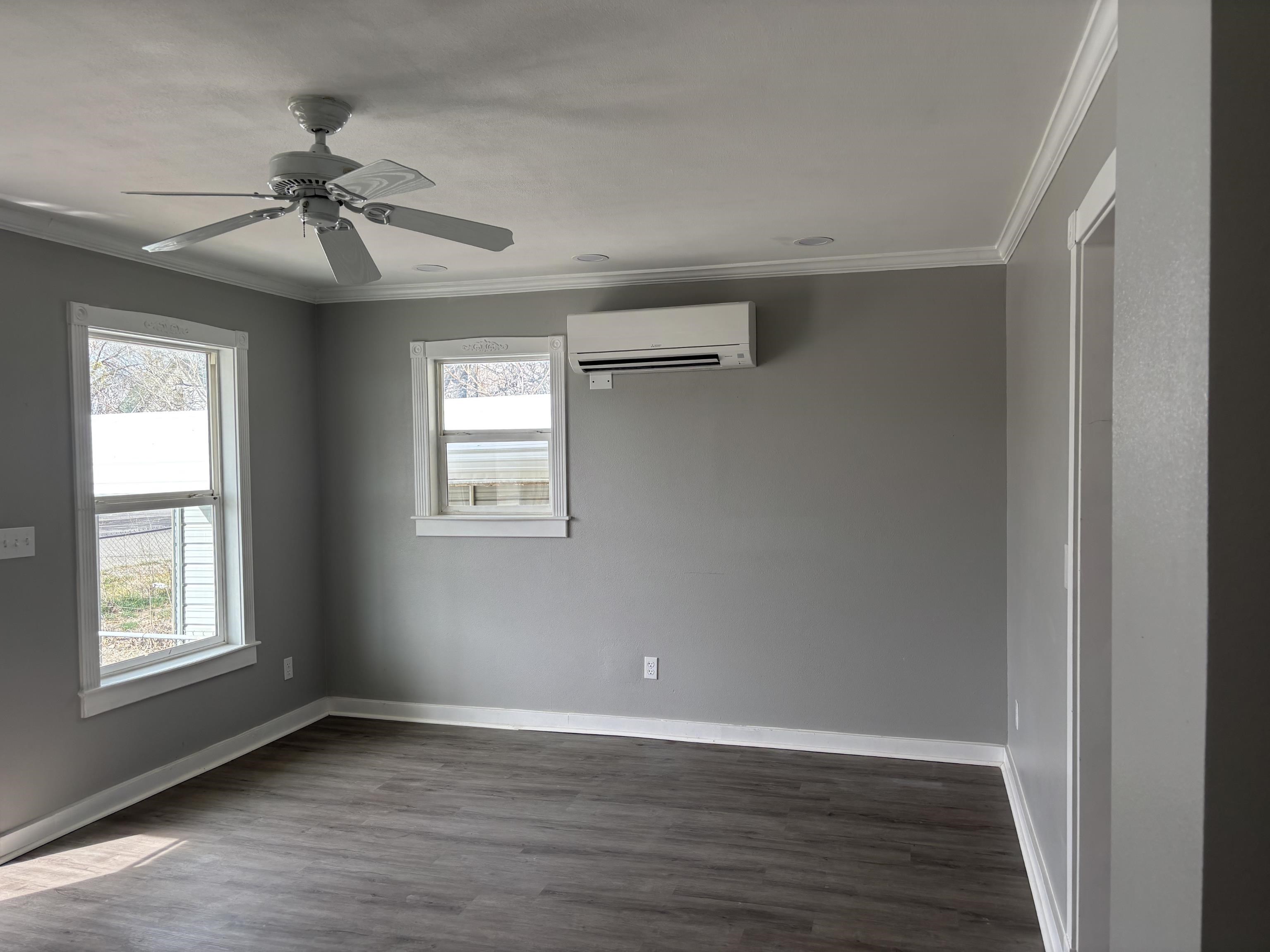 154 3rd Street Clifton, CO 81520 - Photo 14 of 14 a view of an empty room with wooden floor and a window
