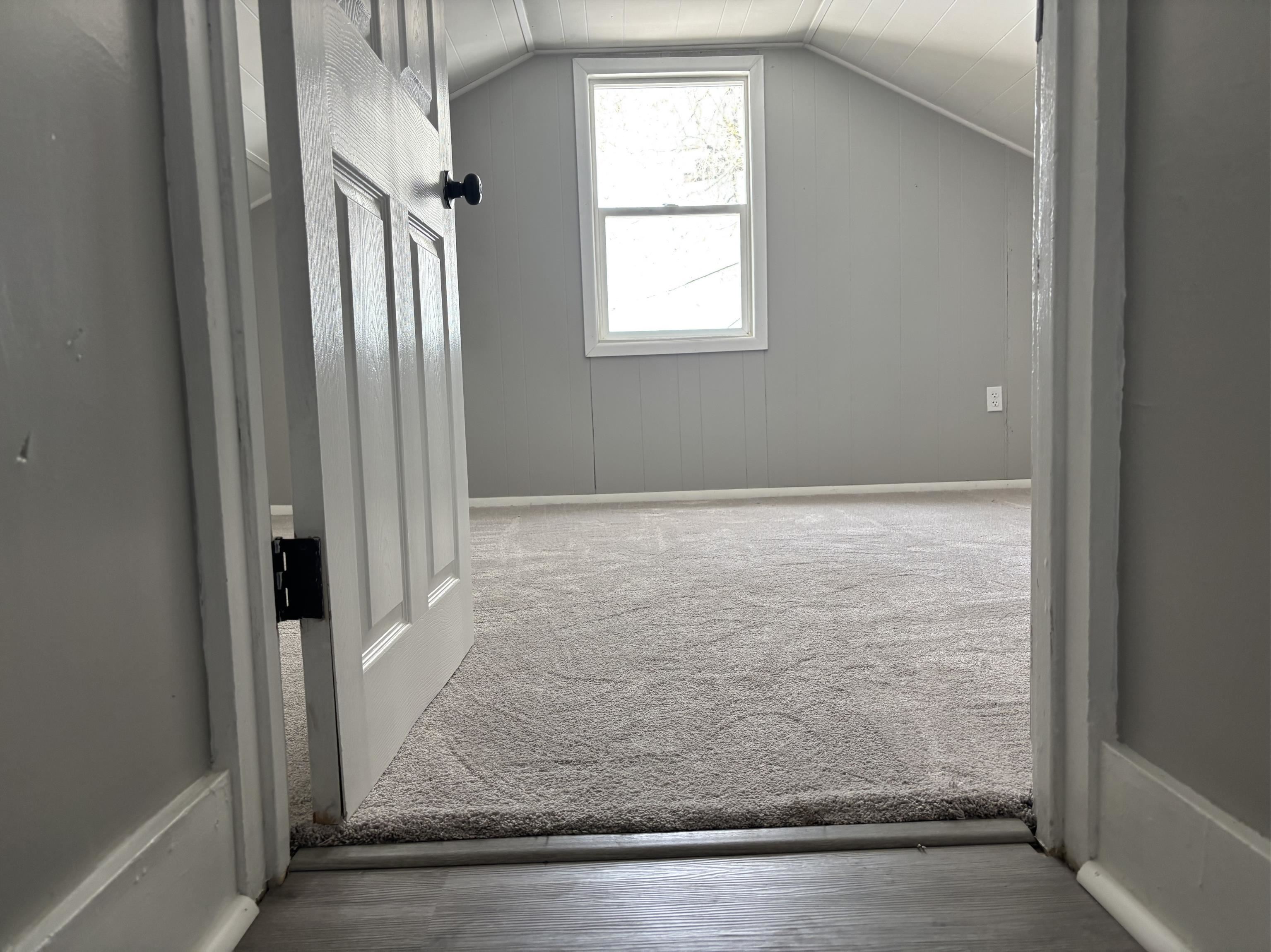 154 3rd Street Clifton, CO 81520 - Photo 10 of 14 an empty room with wooden floor and windows