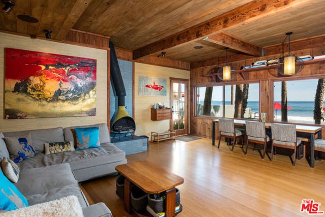 a view of a cafe with sitting area