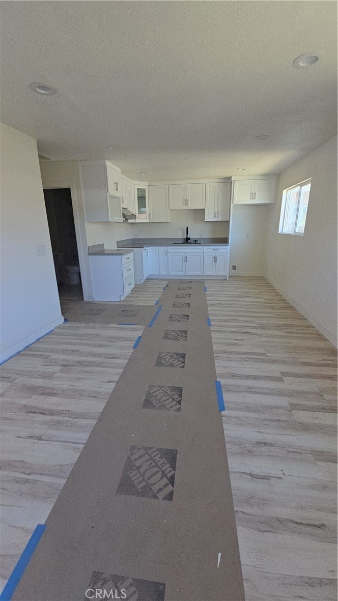 3374-unit A 3374-unit A Fashion Long Beach, CA 90810 - Photo 5 of 16 a view of a living room with furniture and wooden floor