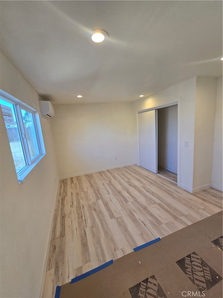 3374-unit A 3374-unit A Fashion Long Beach, CA 90810 - Photo 7 of 16 a view of a room with wooden floor and staircase