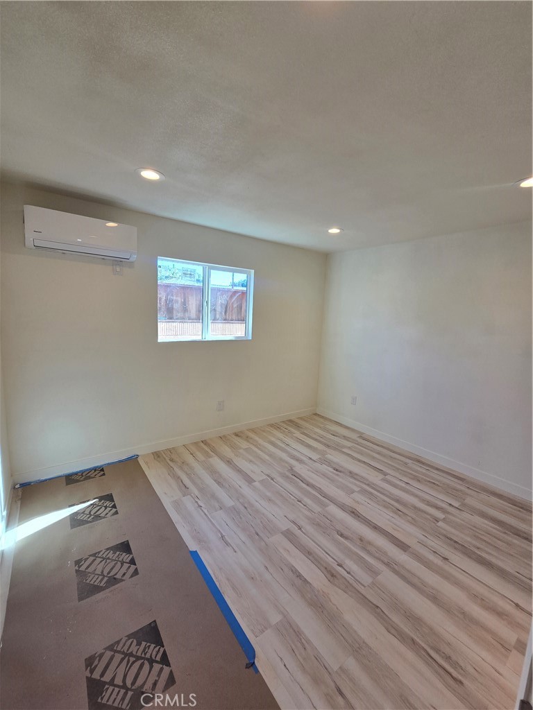 3374-unit A 3374-unit A Fashion Long Beach, CA 90810 - Photo 8 of 16 an empty room with windows