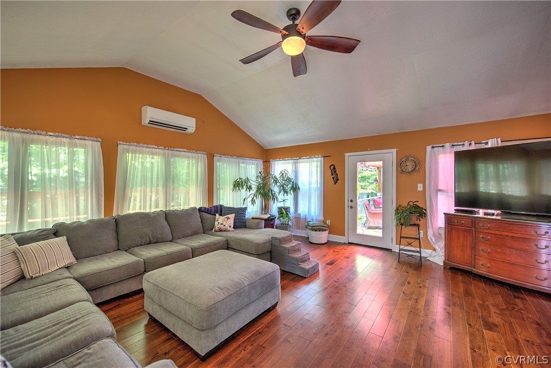 6440 Glebe Point Road Chesterfield, VA 23838 - Photo 15 of 24 a living room with furniture flat screen tv and wooden floor