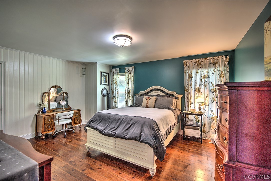 6440 Glebe Point Road Chesterfield, VA 23838 - Photo 17 of 24 a bedroom with a bed and wooden floor