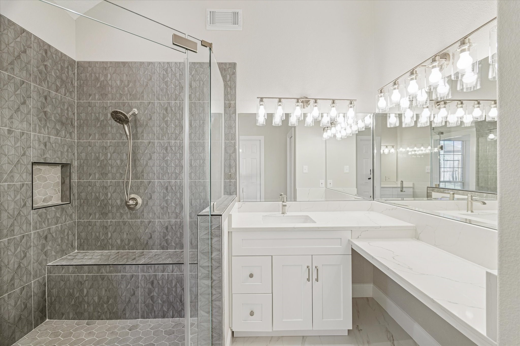 5437 Edgewater Court Willis, TX 77318 - Photo 16 of 29 a bathroom with a sink a toilet and shower
