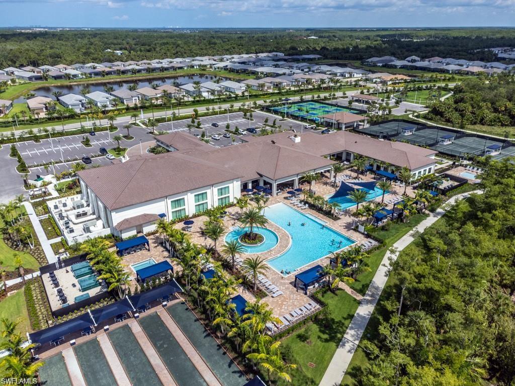 11331 Jacaranda Drive Naples, FL 34120 - Photo 33 of 47 Aerial perspective of pool area