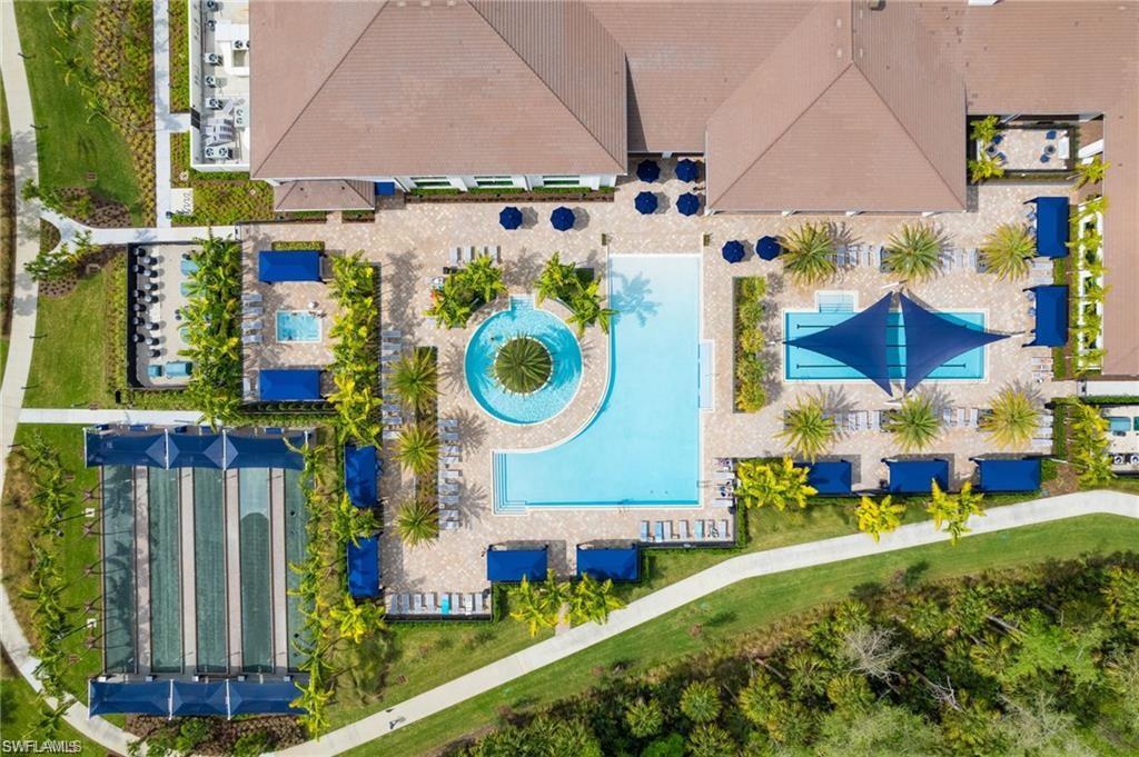 11331 Jacaranda Drive Naples, FL 34120 - Photo 38 of 47 Drone / aerial view of a pool