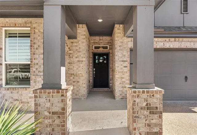 a front view of a building with glass door