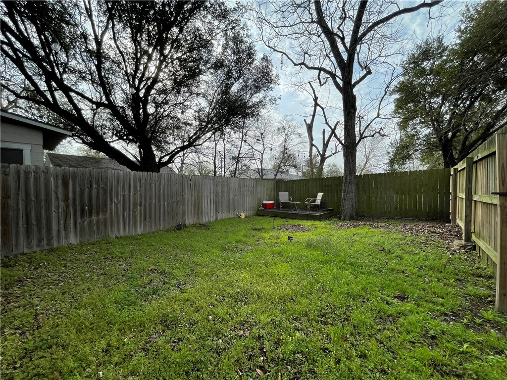 407 East Pease Street Bryan, TX 77803 - Photo 13 of 14 a view of a yard in front of a house with large tree