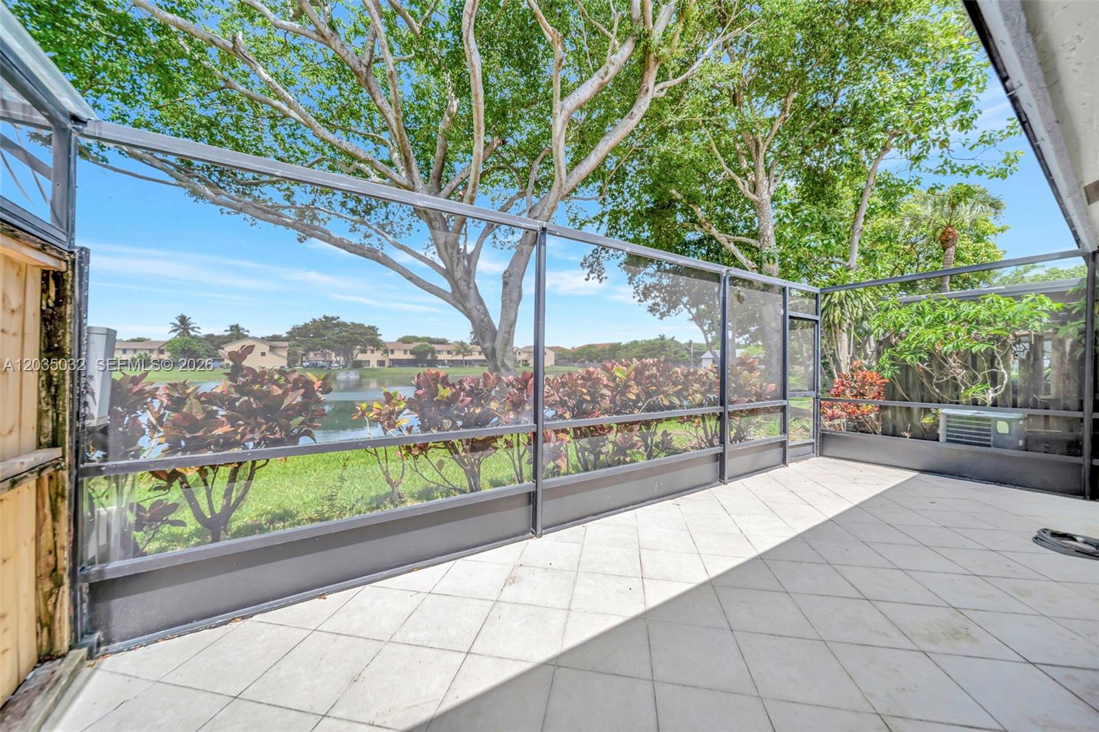 5223 Gate Lake Road, Unit 5223 Tamarac, FL 33319 - Photo 29 of 37 a view of a outdoor space with a street from a balcony