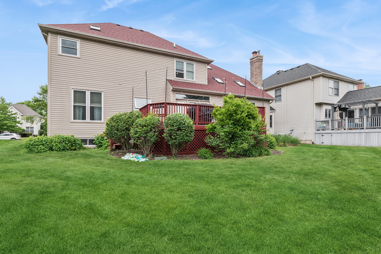 3744 Highknob Circle Naperville, IL 60564 - Photo 20 of 20 a front view of a house with a yard and potted plants