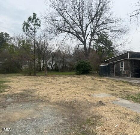 309 Jones Street Roxboro, NC 27573 - Photo 3 of 3 a backyard of a house with lots of green space