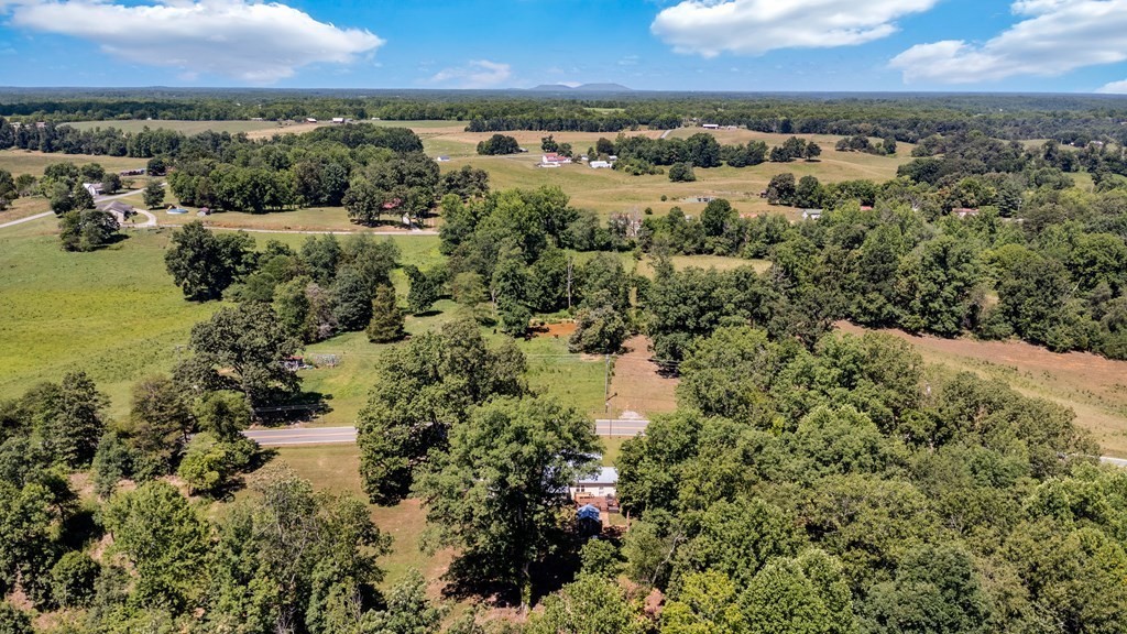 13593 Old Kentucky Road Walling, TN 38587 - Photo 22 of 30 an aerial view of residential houses with outdoor space and trees