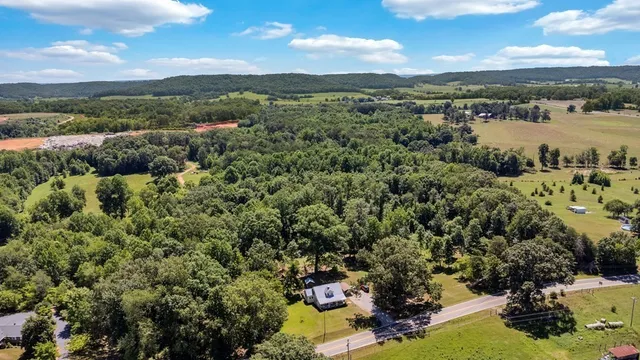 a view of a city with mountains in the background