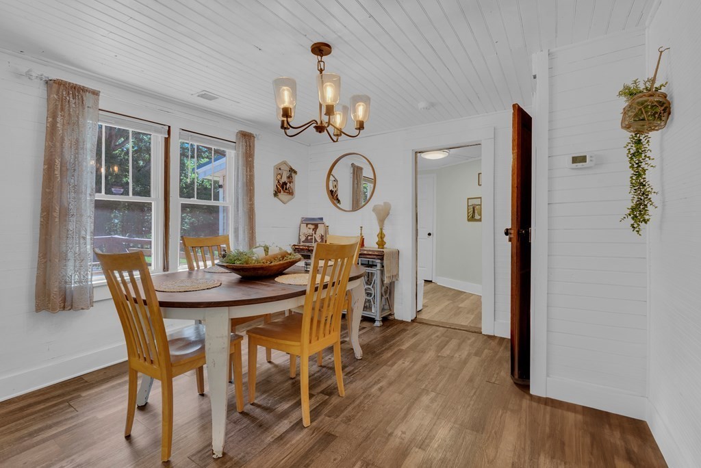 13593 Old Kentucky Road Walling, TN 38587 - Photo 6 of 30 a view of a dining room with furniture and wooden floor