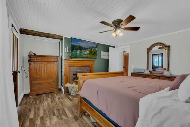 a bed room with a bed and a chandelier