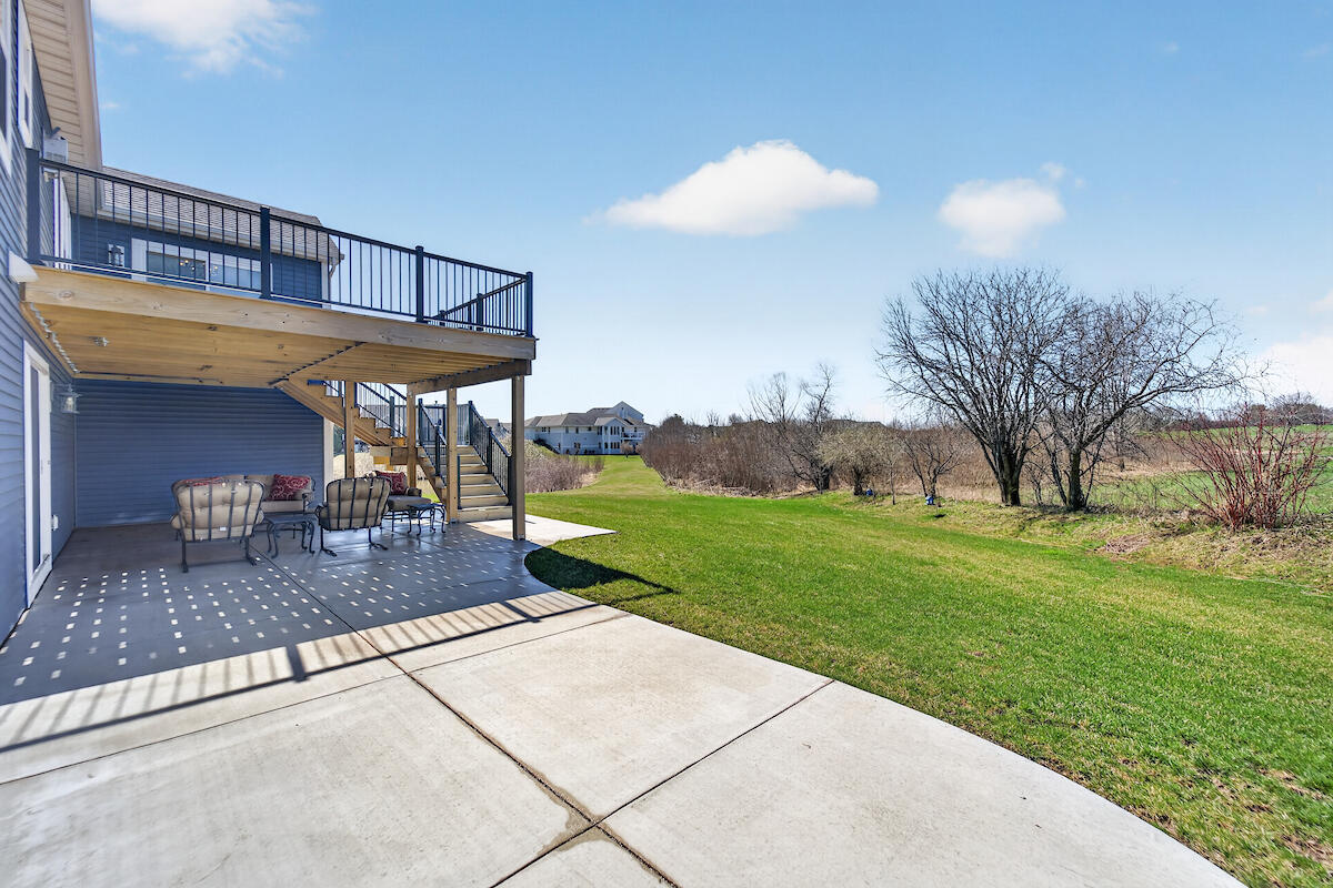 879 Amber Lane Port Washington, WI 53074 - Photo 2 of 29 Double level deck w/side patio