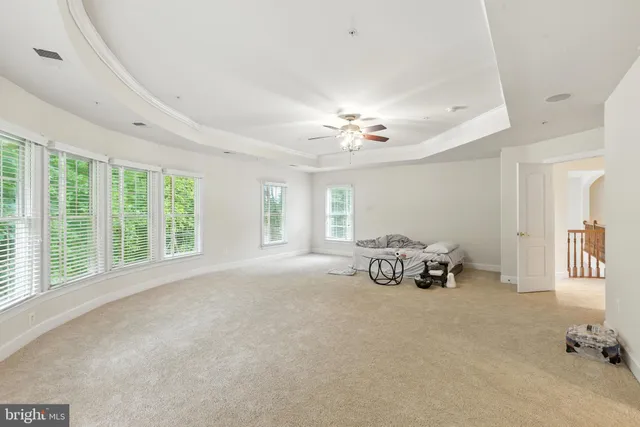 a large bathroom with a double vanity sink large mirror bathtub and shower