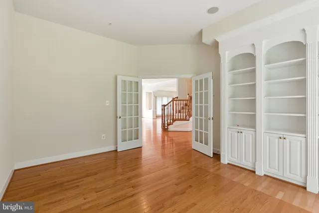 a view of entryway with stairs and wooden floor