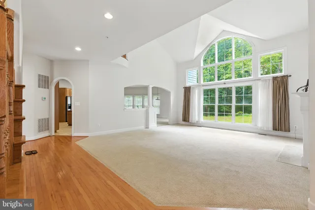 a view of a hallway with staircase