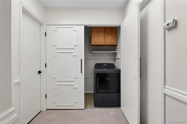 a view of kitchen and utility room