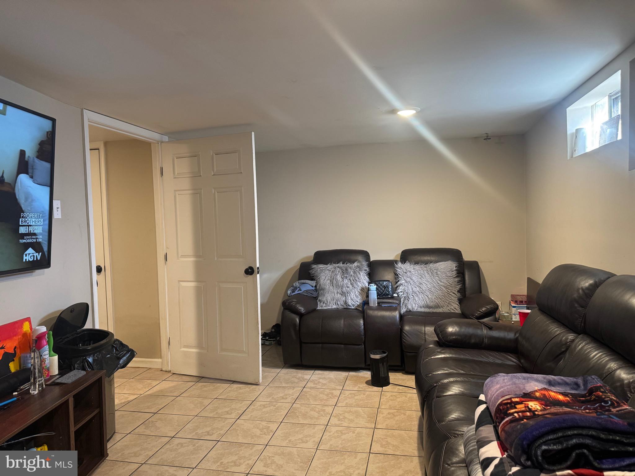 1653 Stonewood Road Baltimore, MD 21239 - Photo 14 of 17 a living room with furniture