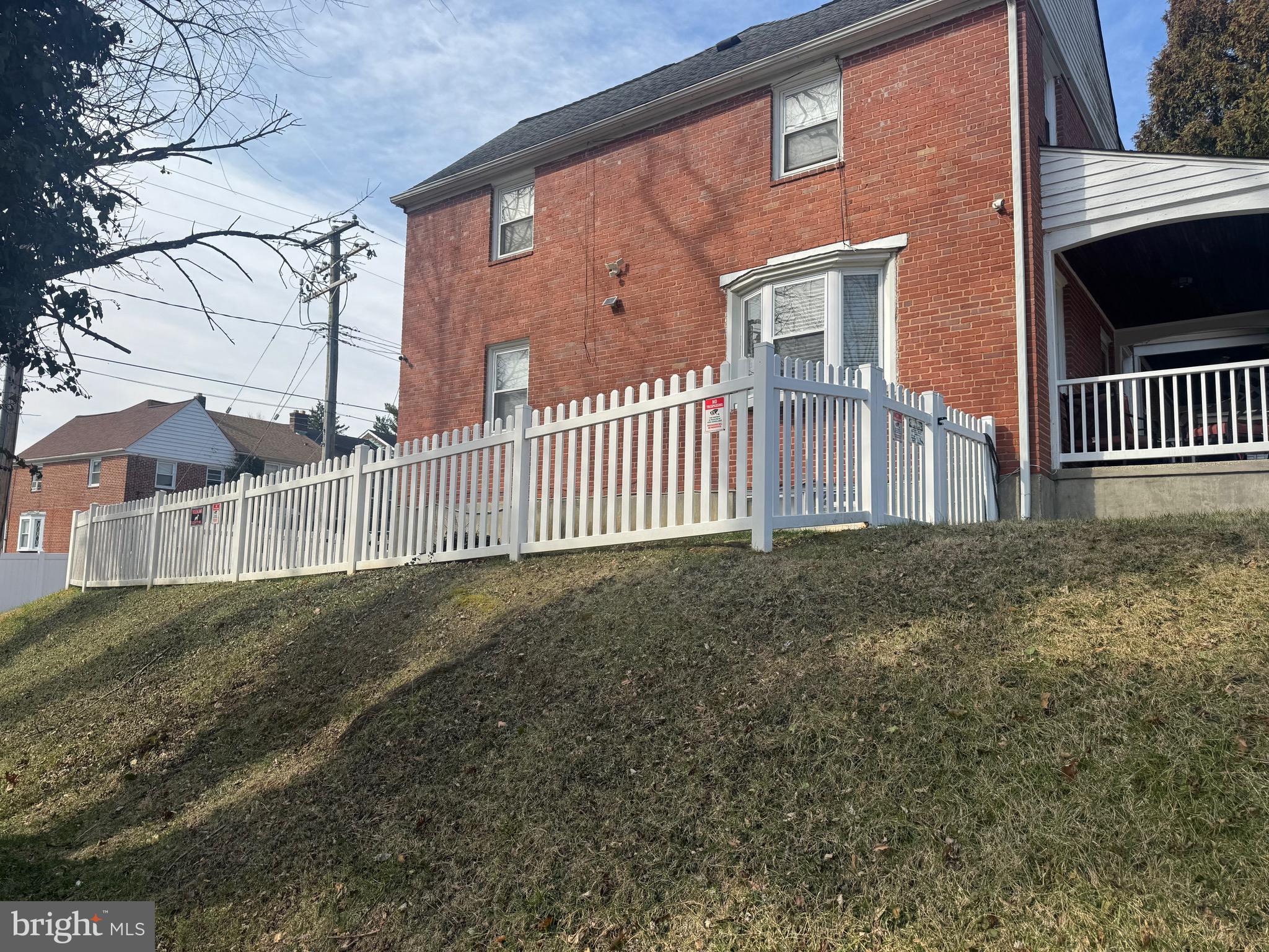 1653 Stonewood Road Baltimore, MD 21239 - Photo 17 of 17 a view of a house with a yard