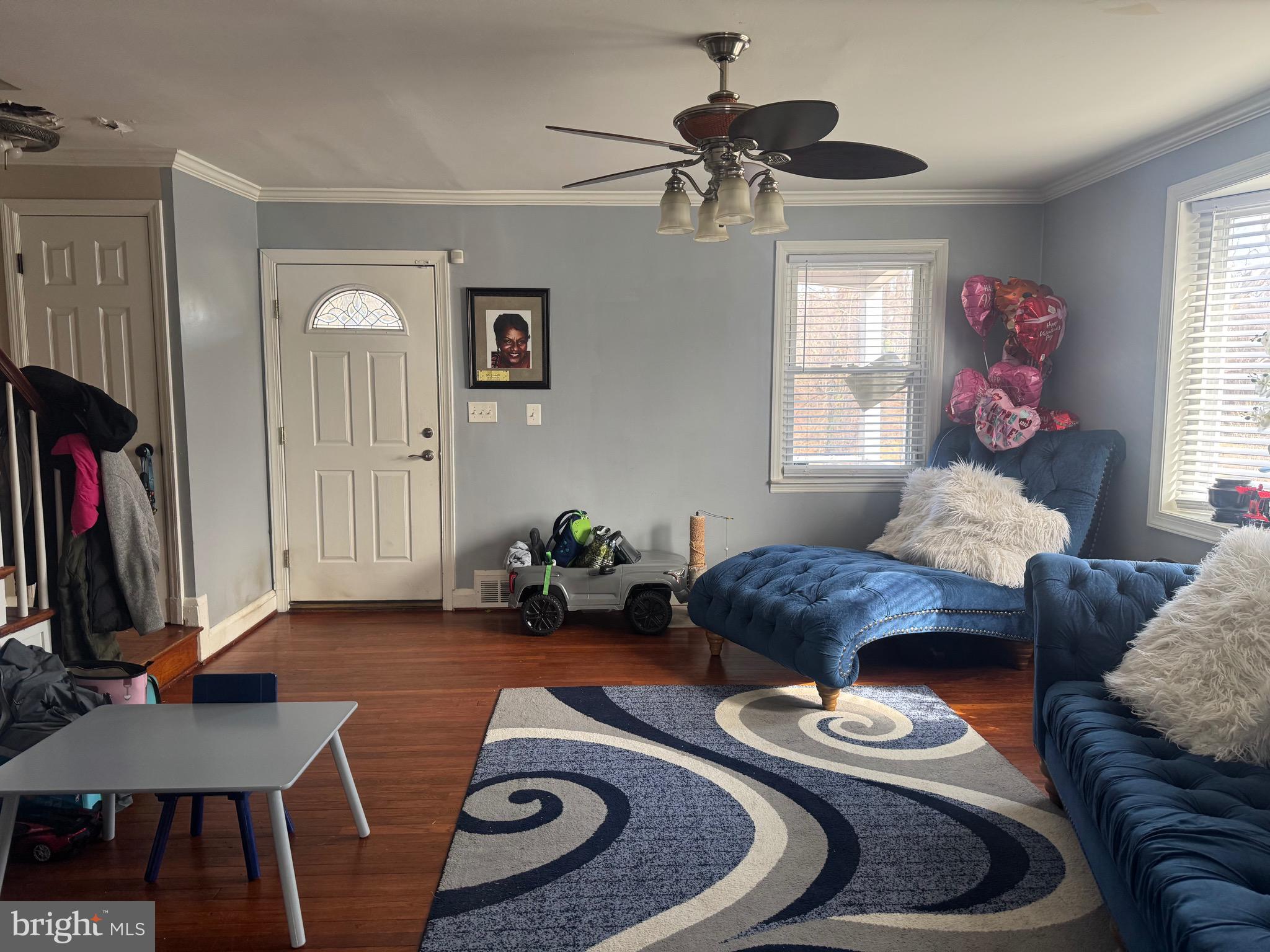1653 Stonewood Road Baltimore, MD 21239 - Photo 5 of 17 a living room with furniture and a window