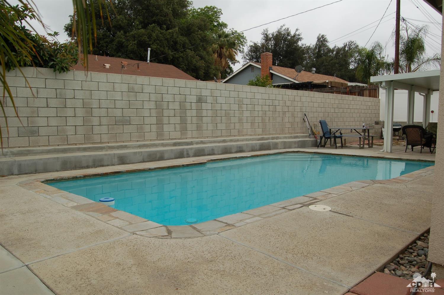 4591 Toyon Road Riverside, CA 92504 - Photo 2 of 40 a front view of a house with garden