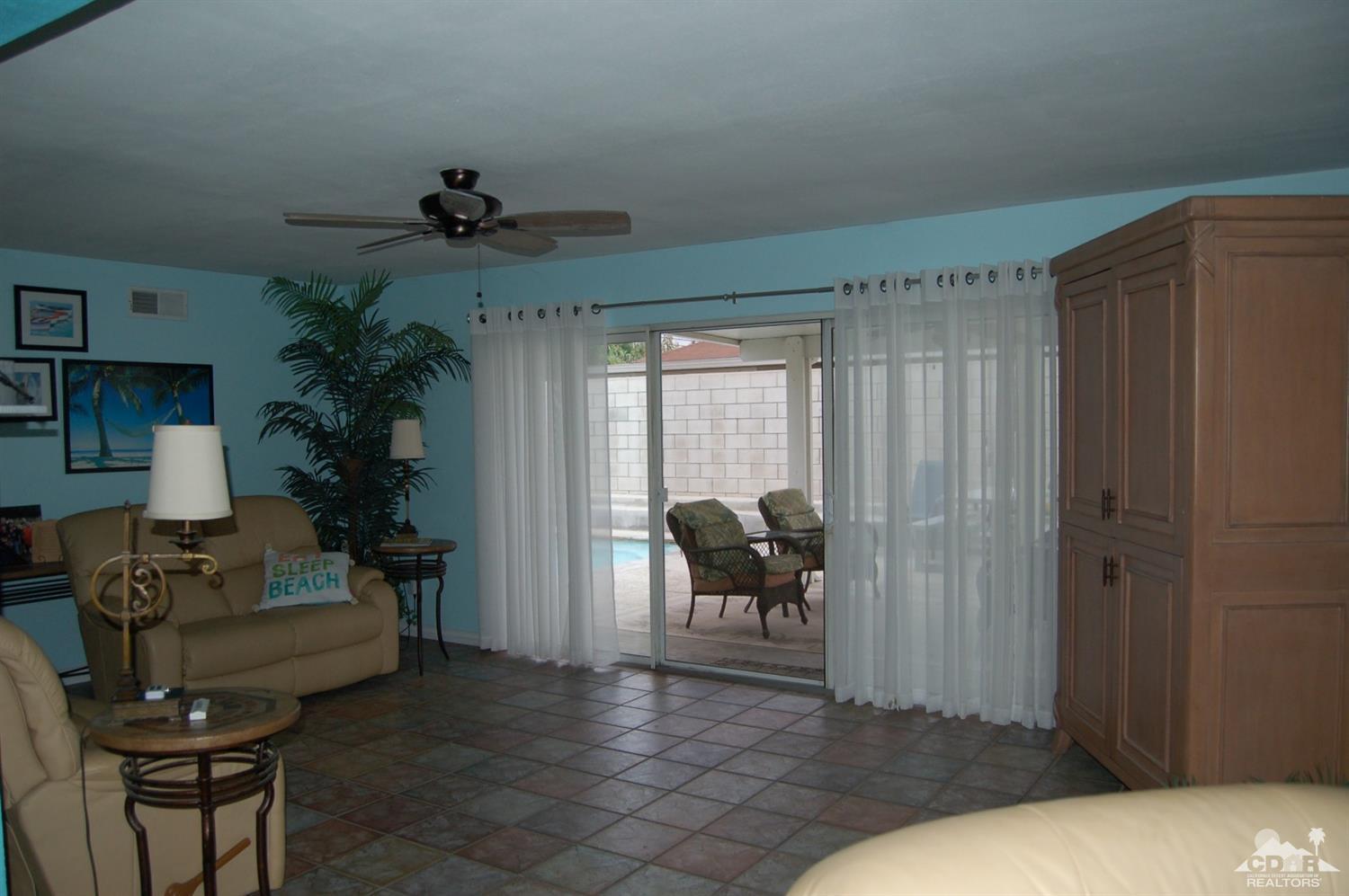 4591 Toyon Road Riverside, CA 92504 - Photo 13 of 40 a living room with furniture and a potted plant