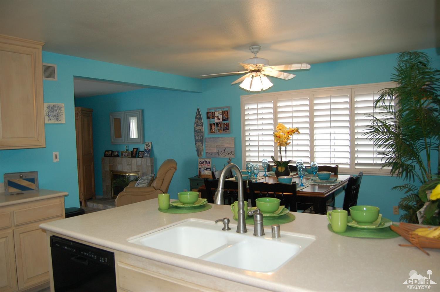 4591 Toyon Road Riverside, CA 92504 - Photo 22 of 40 a dining room with furniture and a large window