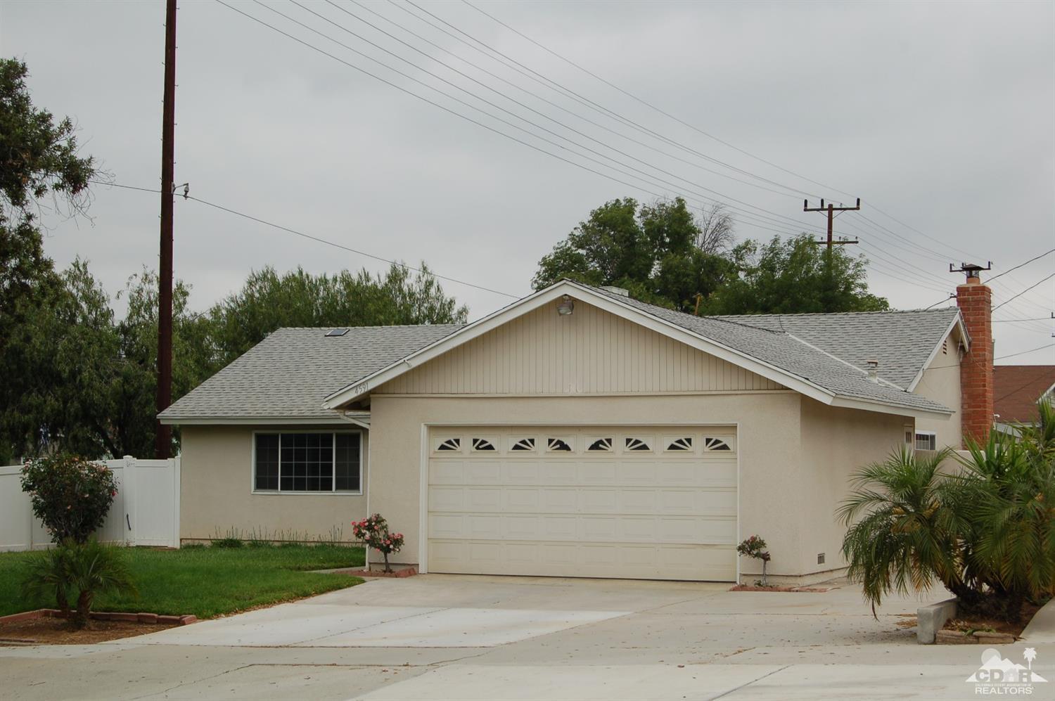 4591 Toyon Road Riverside, CA 92504 - Photo 24 of 40 a view of a house with a yard