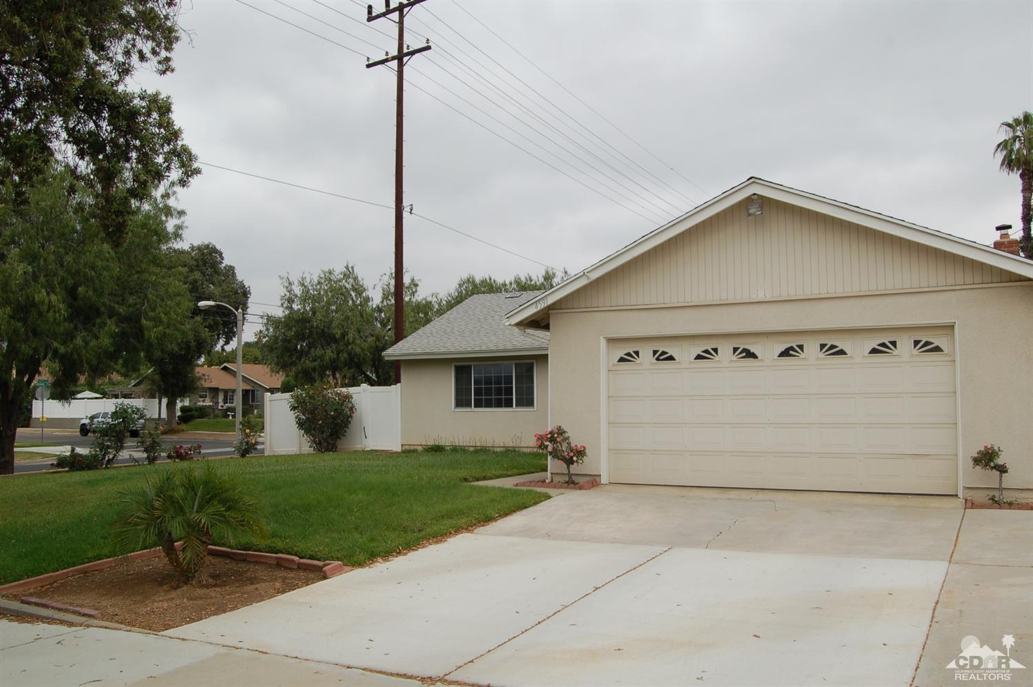 4591 Toyon Road Riverside, CA 92504 - Photo 27 of 40 a view of a house with a yard and plants
