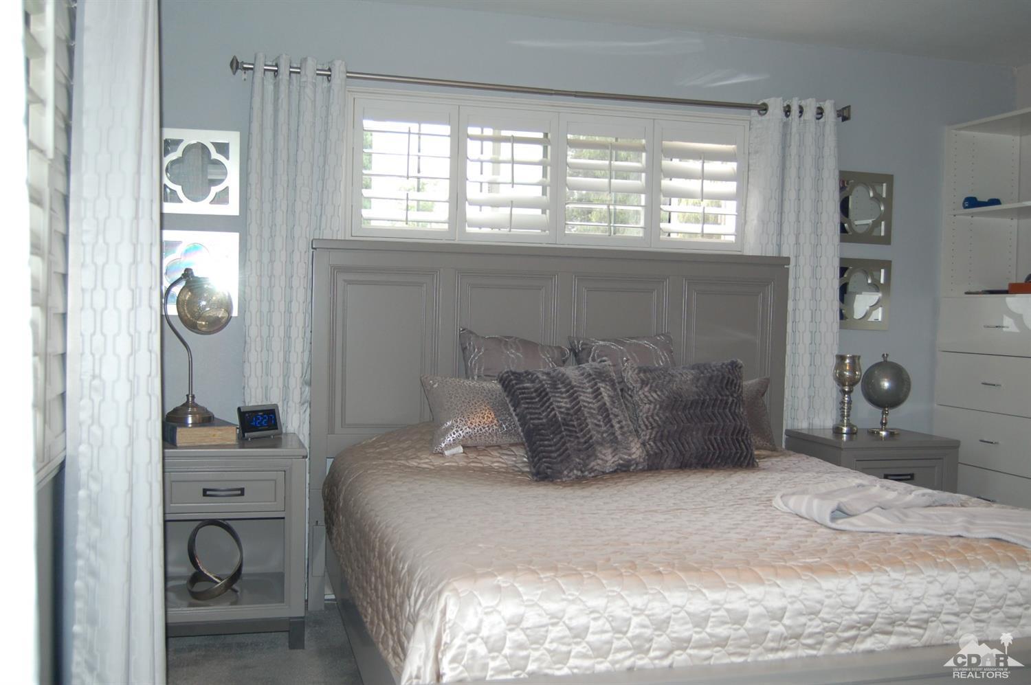 4591 Toyon Road Riverside, CA 92504 - Photo 31 of 40 a bedroom with a bed and a window