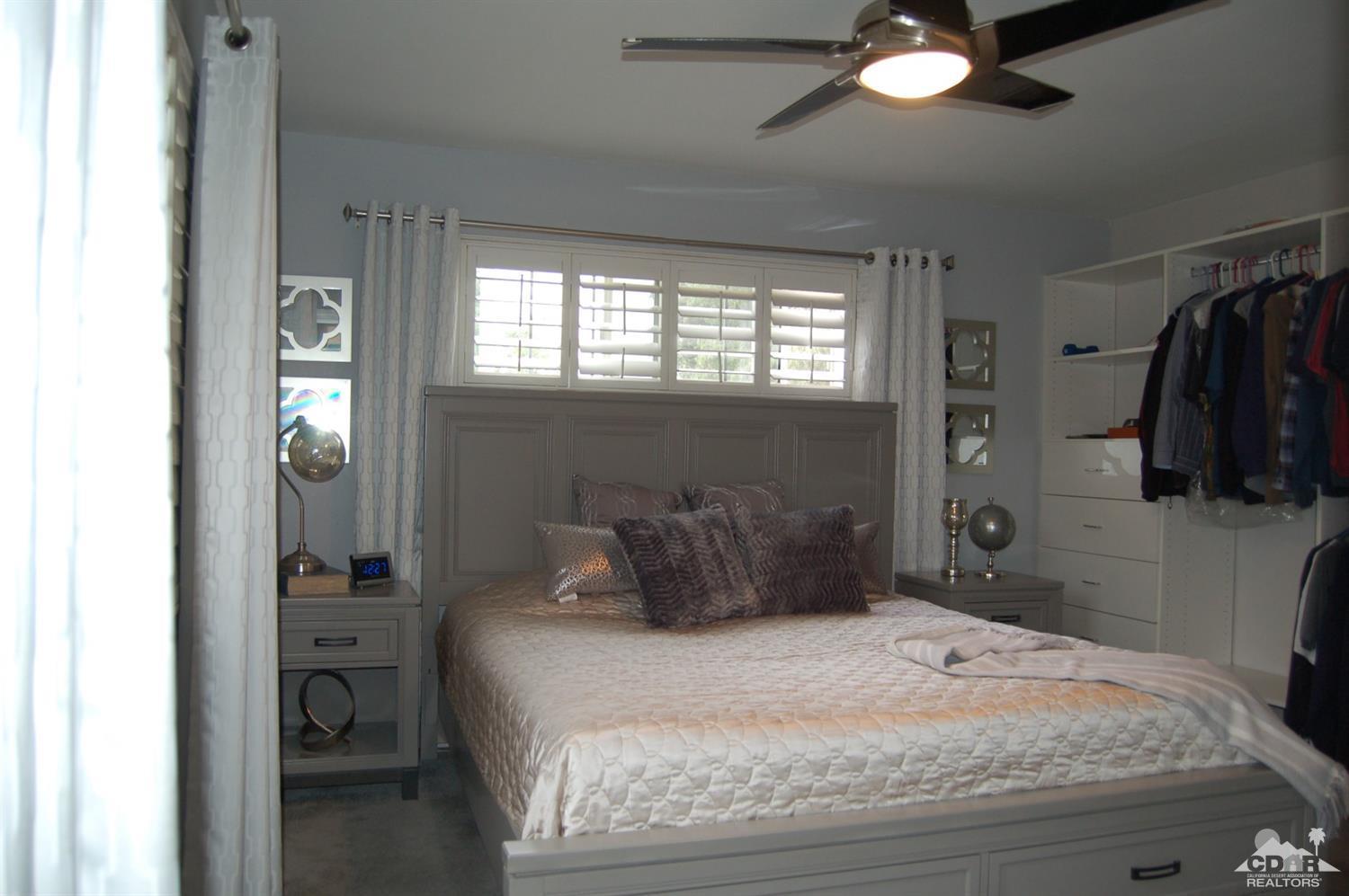 4591 Toyon Road Riverside, CA 92504 - Photo 32 of 40 a bedroom with a bed and tv