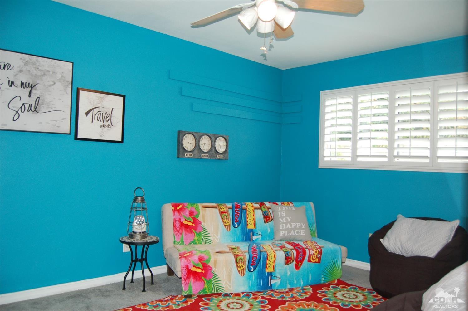 4591 Toyon Road Riverside, CA 92504 - Photo 37 of 40 a room with furniture and a window