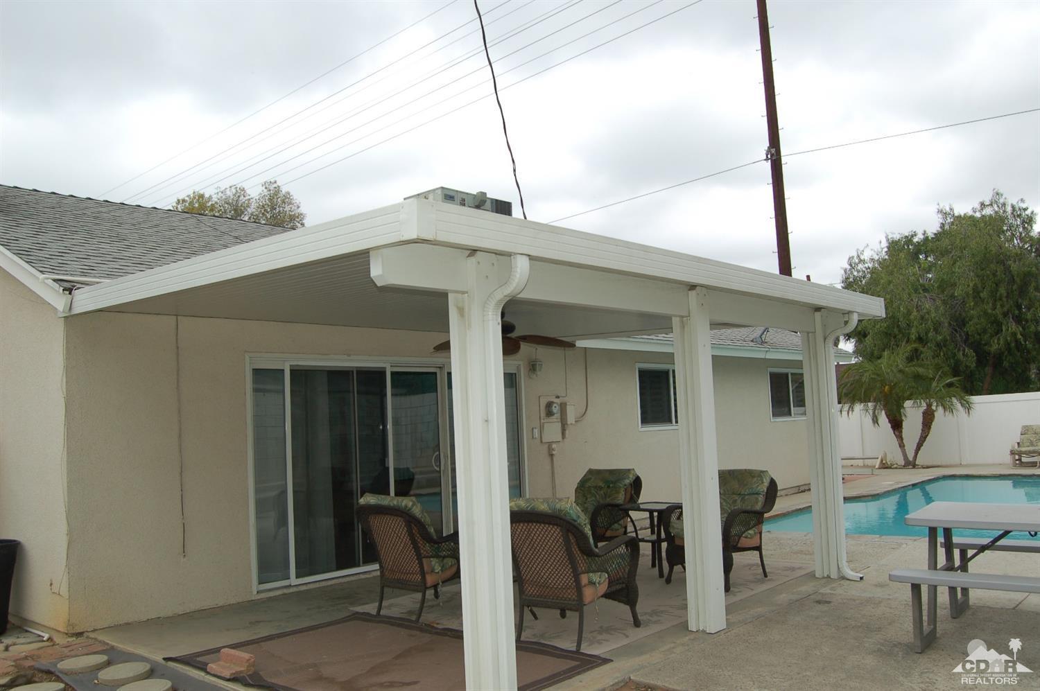 4591 Toyon Road Riverside, CA 92504 - Photo 10 of 40 a front view of a house with outdoor seating