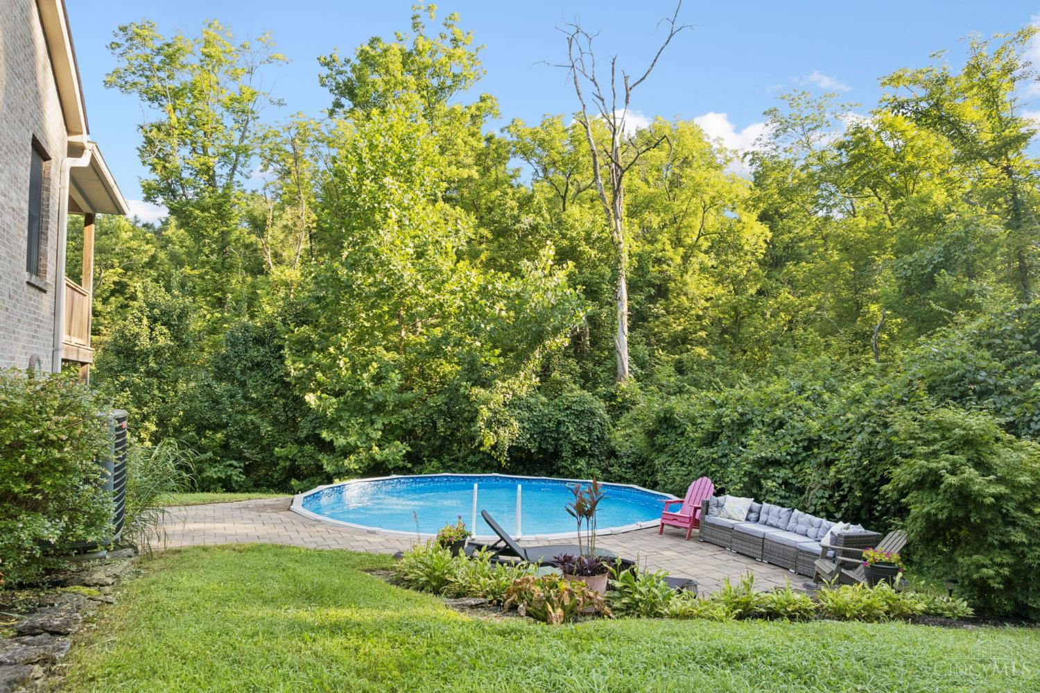 6050 Dry Ridge Road Cincinnati, OH 45252 - Photo 44 of 57 Lower level walkout to paver patio that extends to pool area.