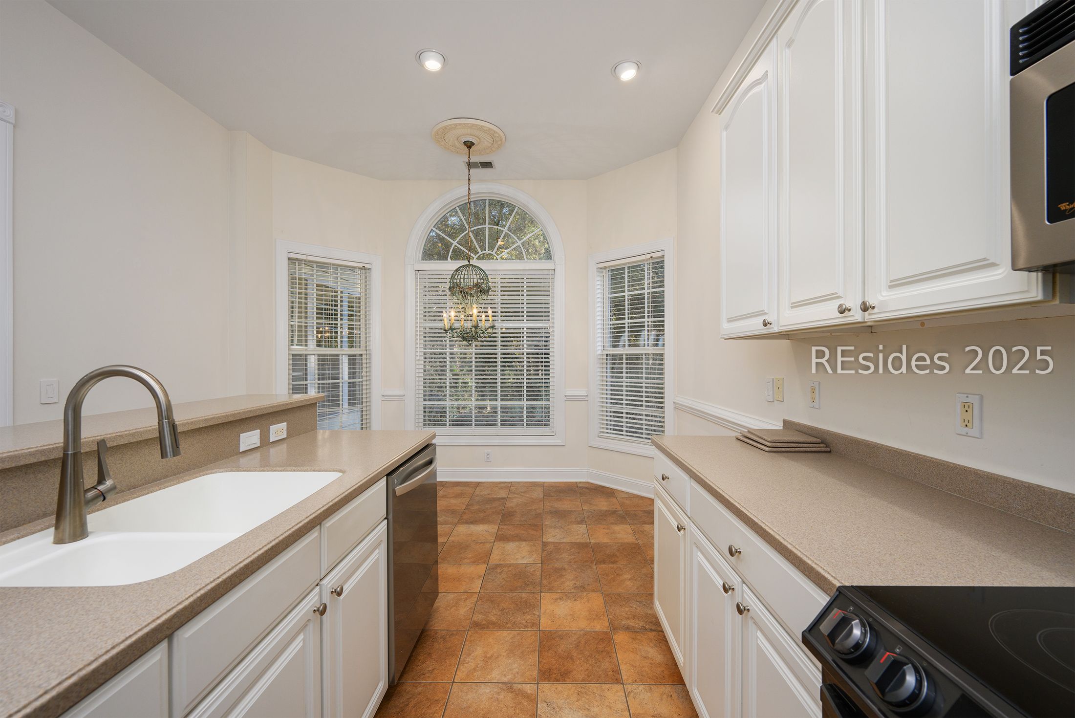 7 Crescent Circle Bluffton, SC 29910 - Photo 15 of 53 Tiled floor plus lots of extra ceiling lights.