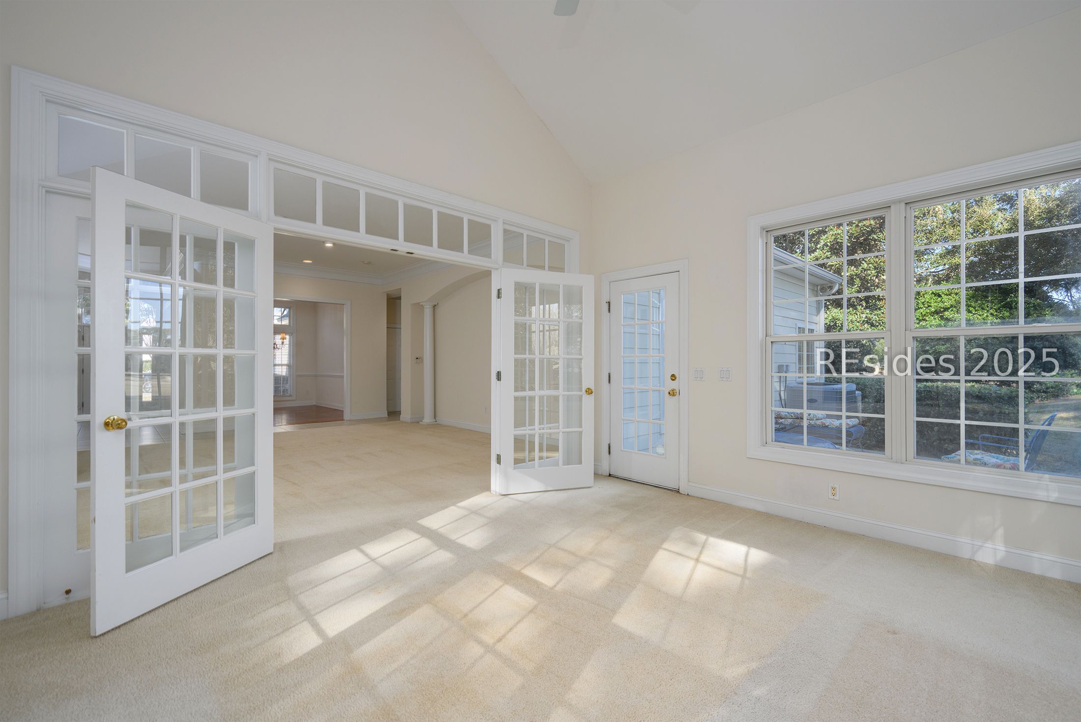7 Crescent Circle Bluffton, SC 29910 - Photo 20 of 53 Double French doors w/transoms & patio door.
