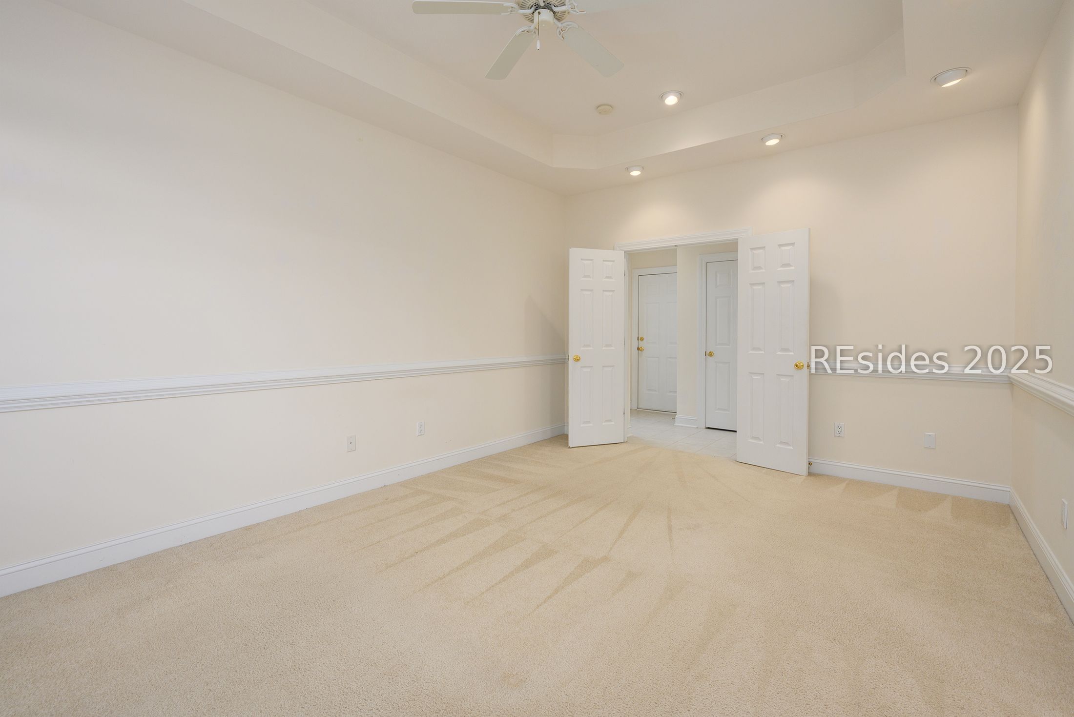 7 Crescent Circle Bluffton, SC 29910 - Photo 24 of 53 Double door entrance to primary bedroom.