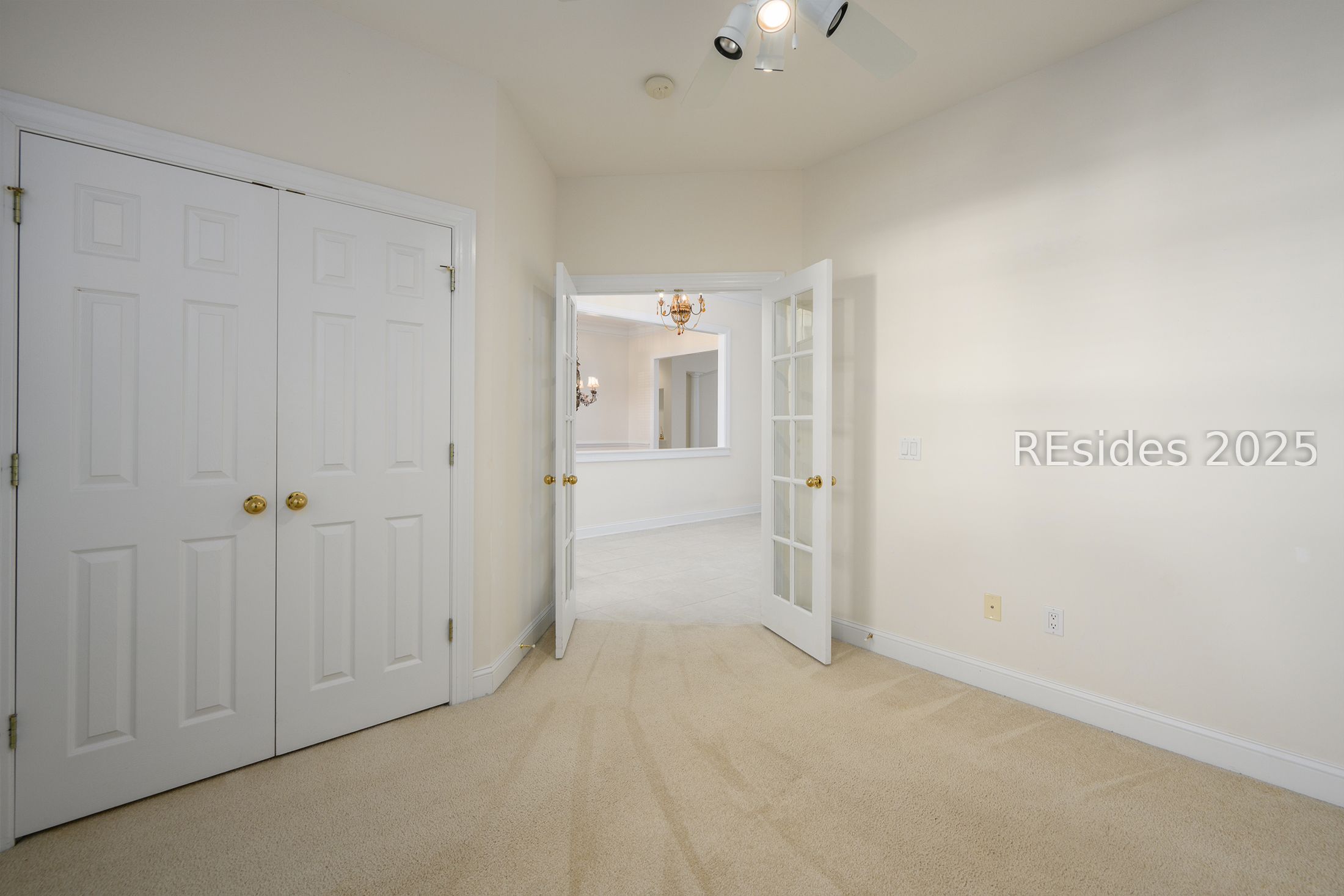 7 Crescent Circle Bluffton, SC 29910 - Photo 30 of 53 Guest Bedroom 1 w/double closet & French doors.