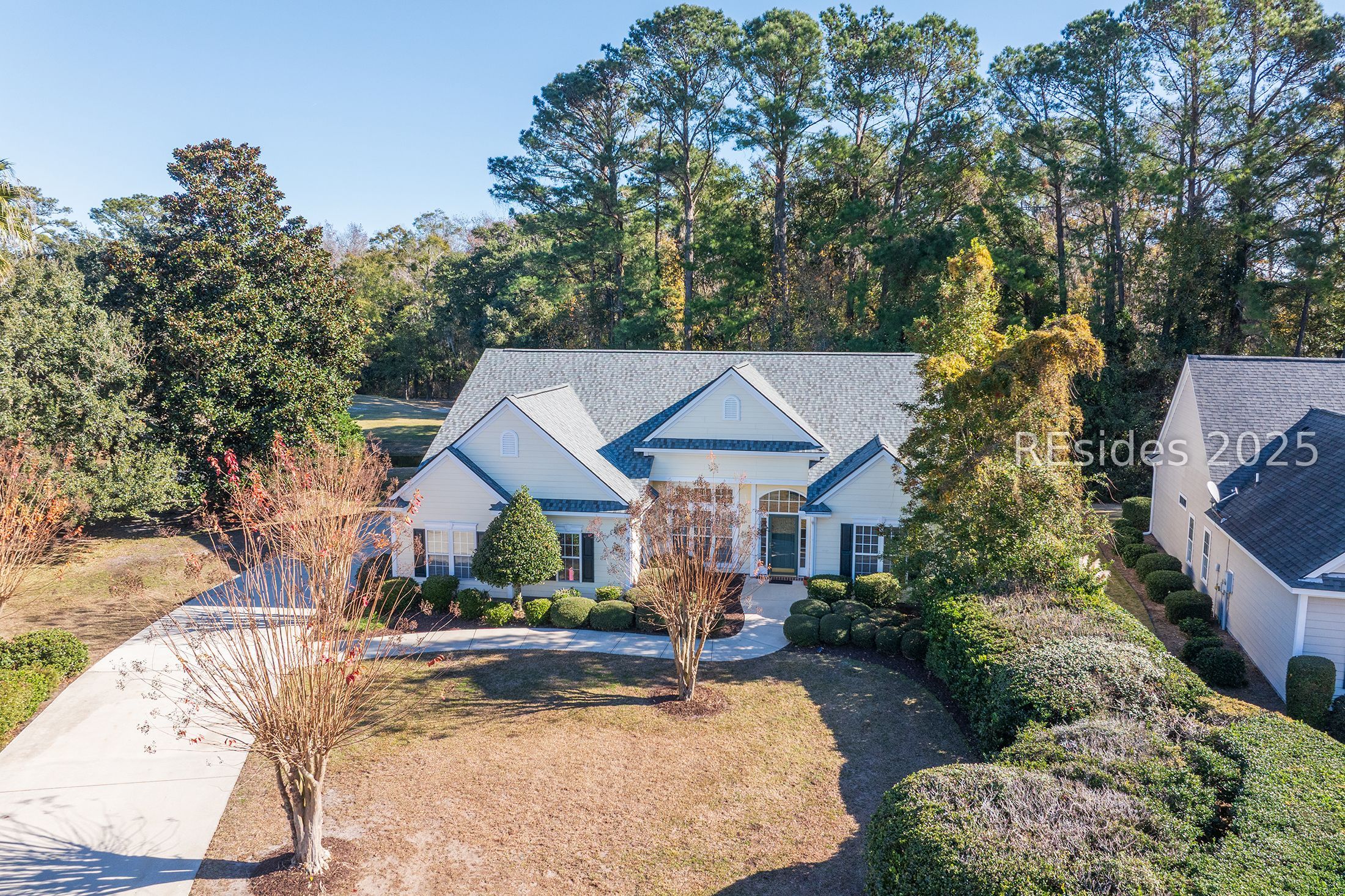 7 Crescent Circle Bluffton, SC 29910 - Photo 3 of 53 Enjoy a sunroom with a lagoon to golf view!