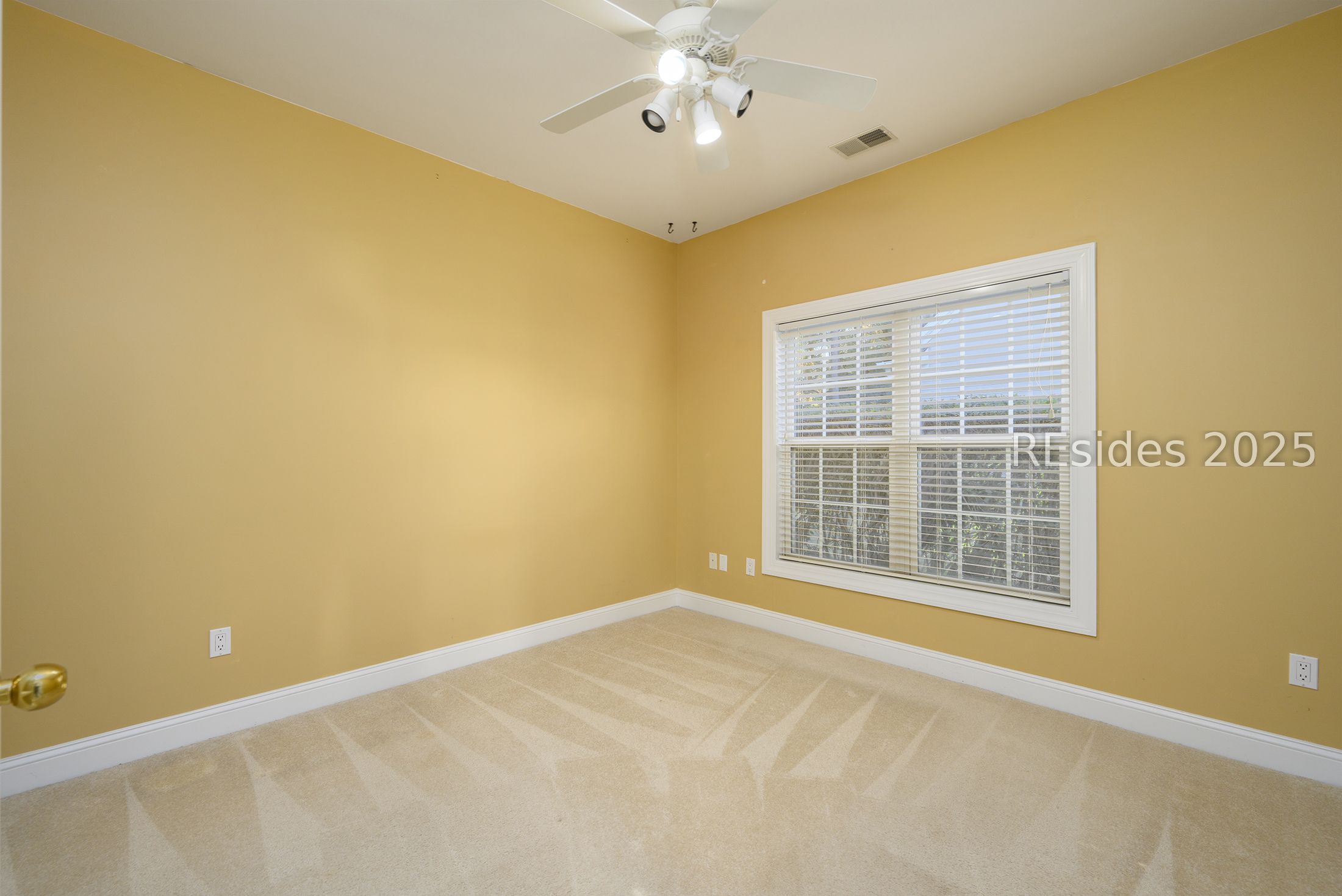 7 Crescent Circle Bluffton, SC 29910 - Photo 33 of 53 Double windows, carpeted floor, ceiling fan.