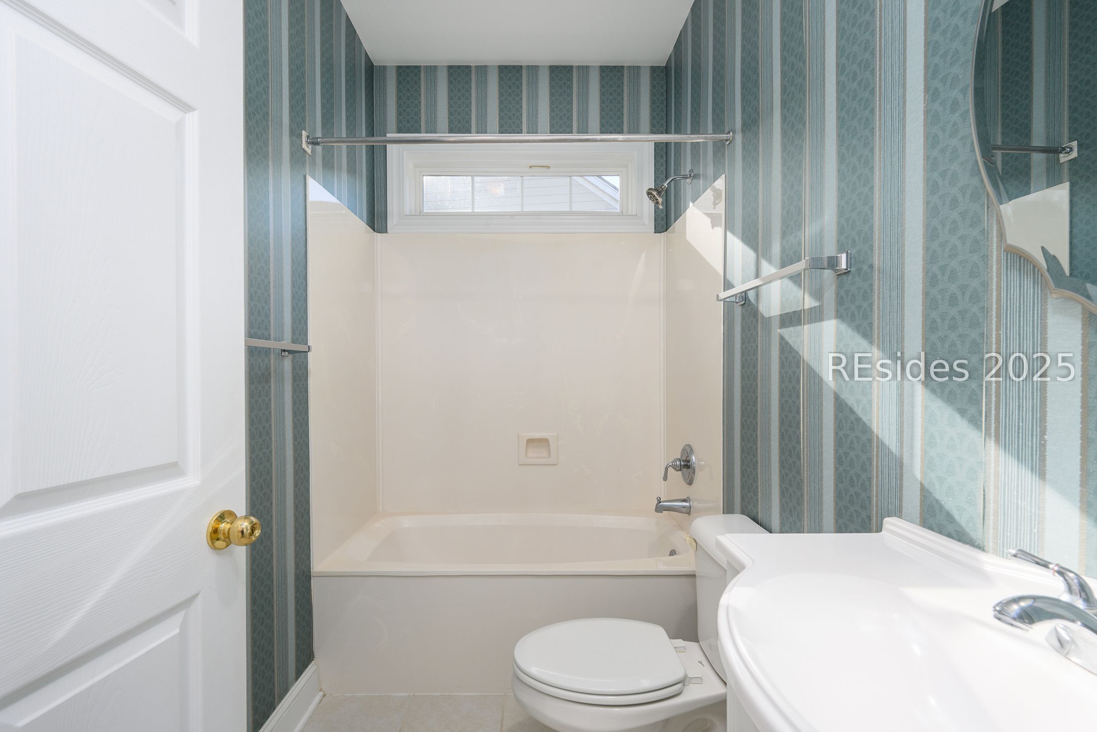 7 Crescent Circle Bluffton, SC 29910 - Photo 35 of 53 Corian tub/shower with transom window.