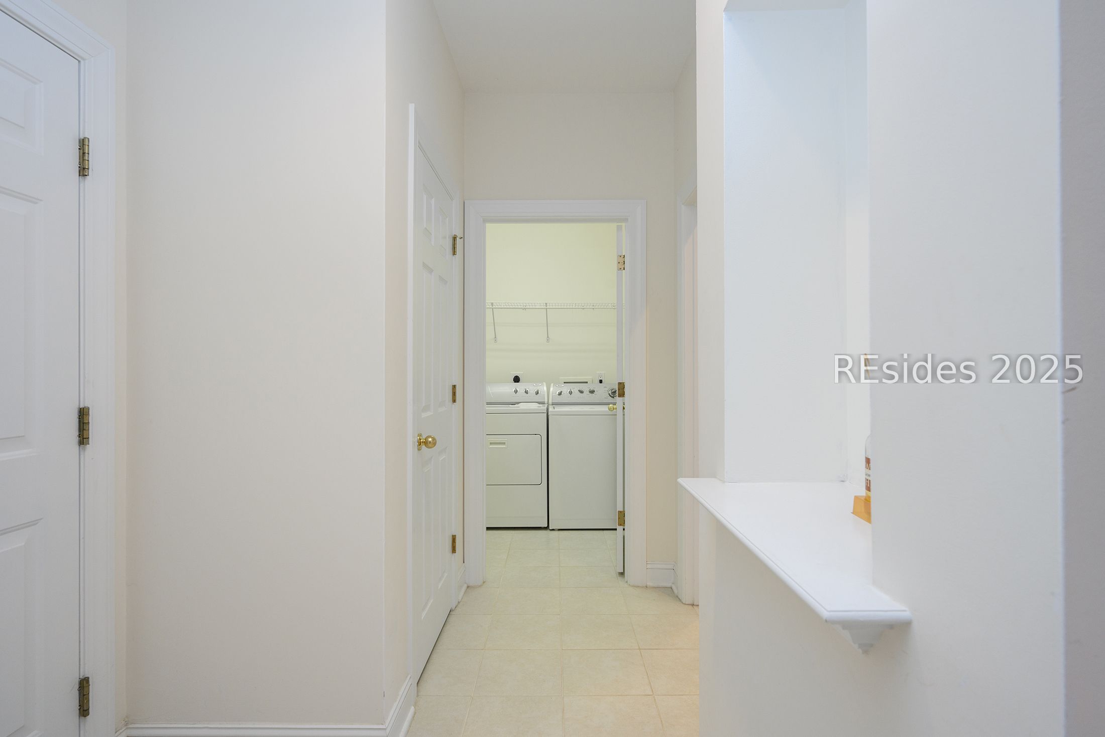 7 Crescent Circle Bluffton, SC 29910 - Photo 36 of 53 Hall to Primary bdrm, laundry and garage.